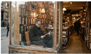A reader in a bookshop