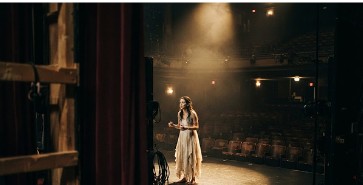 Performer on a theatre stage